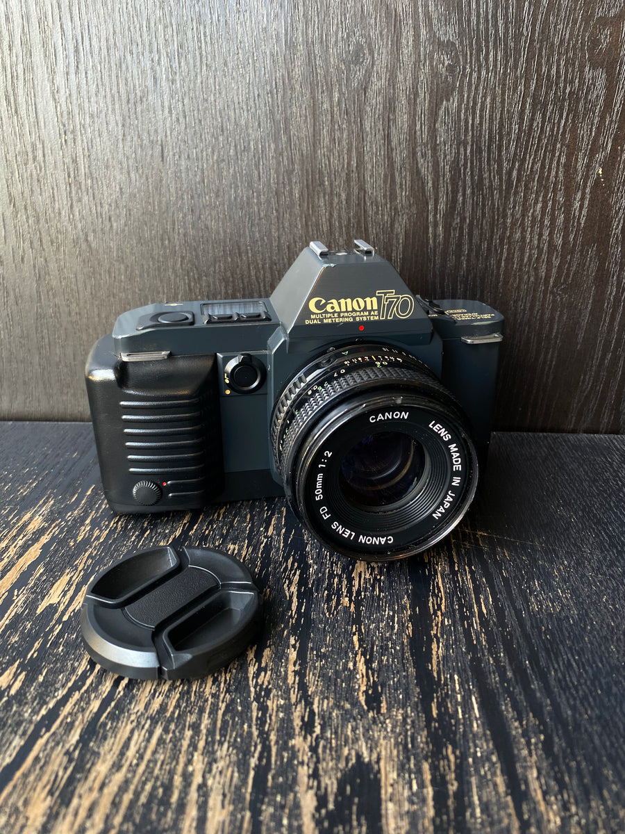 Canon T70 FD 50mm 1:2 пленочный фотоаппарат – Retrocam