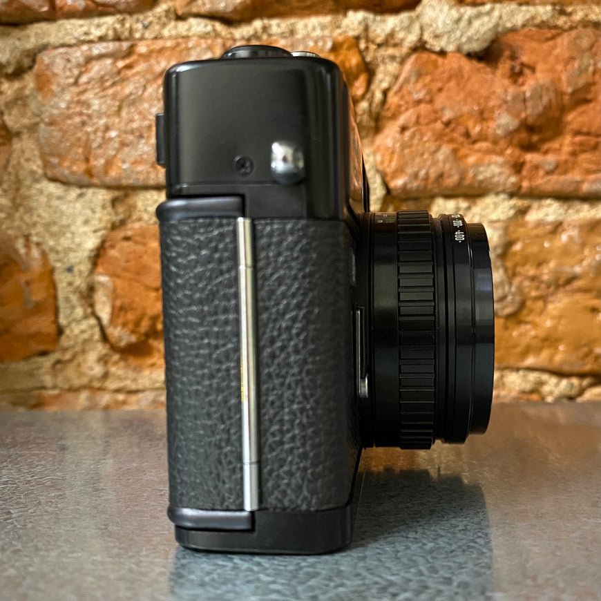 Minolta HI-MATIC E пленочный фотоаппарат дальномерный