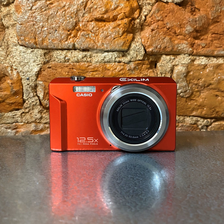 Casio Exilim EX-ZS100 красный цифровой фотоаппарат