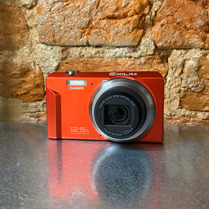 Casio Exilim EX-ZS100 красный цифровой фотоаппарат