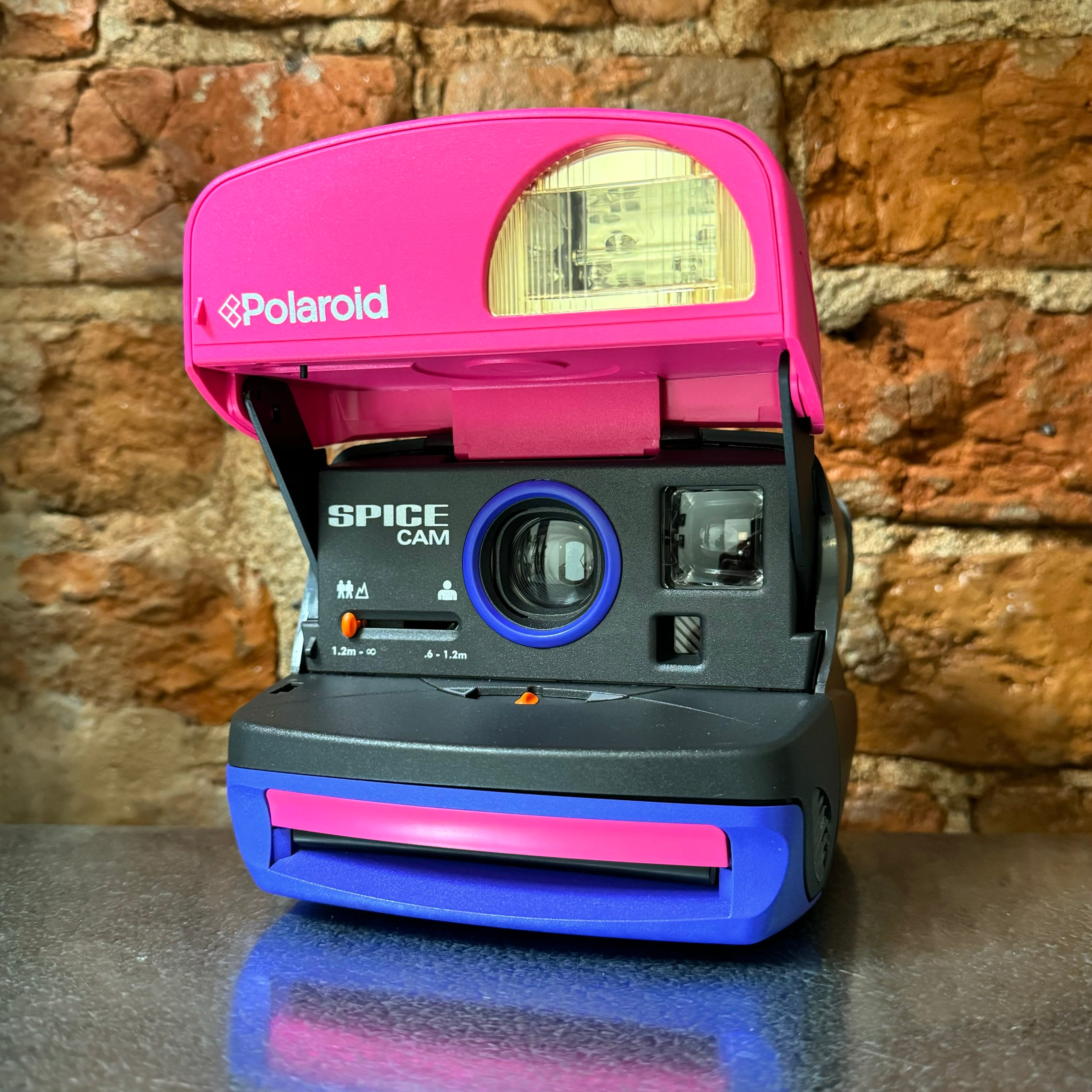 Polaroid Spice Cam Spice Girls Instant Film Camera Polaroid 600 + 1 Color Cartridge ... Shipping is Via UPS Polaroid Spice Cam Spice Girls Instant Film Camera Polaroid 600 + 1 Color Cartridge ... Shipping is Via UPS