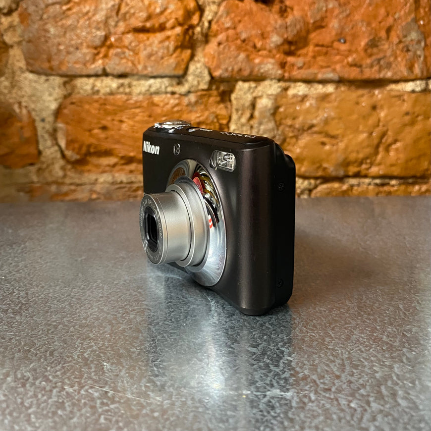 Nikon Coolpix L21 коричневый цифровой фотоаппарат