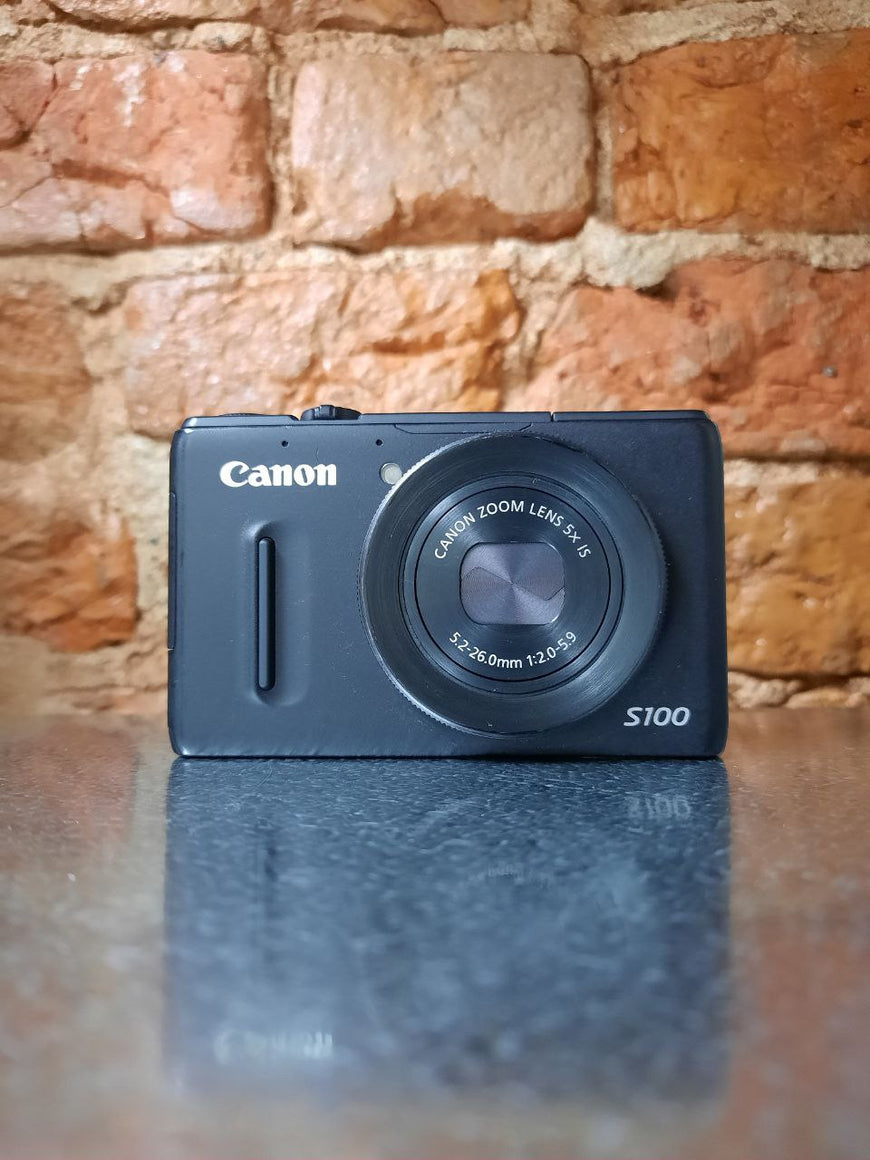 Canon PowerShot S100 черный топовый цифровой фотоаппарат