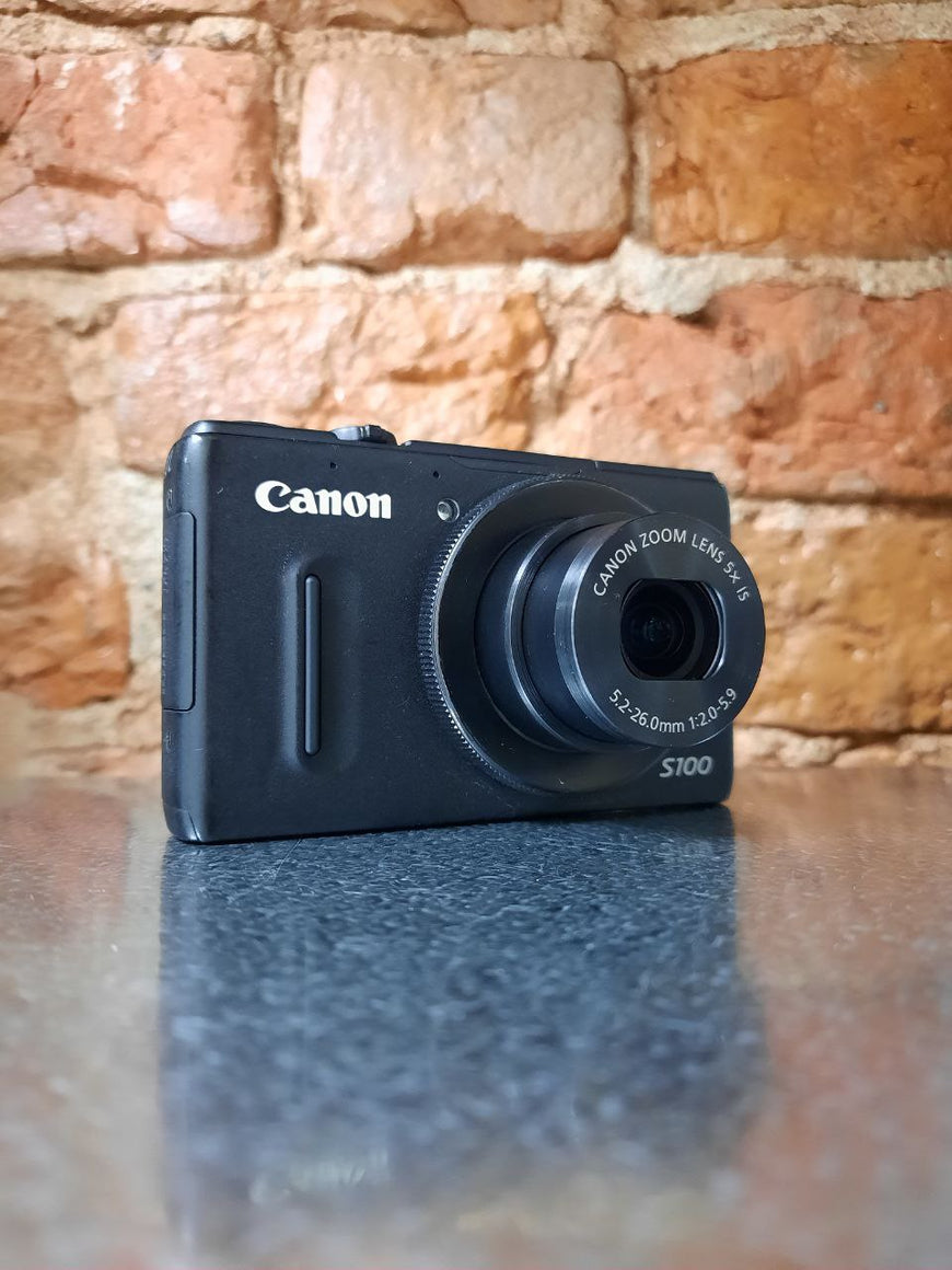 Canon PowerShot S100 черный топовый цифровой фотоаппарат