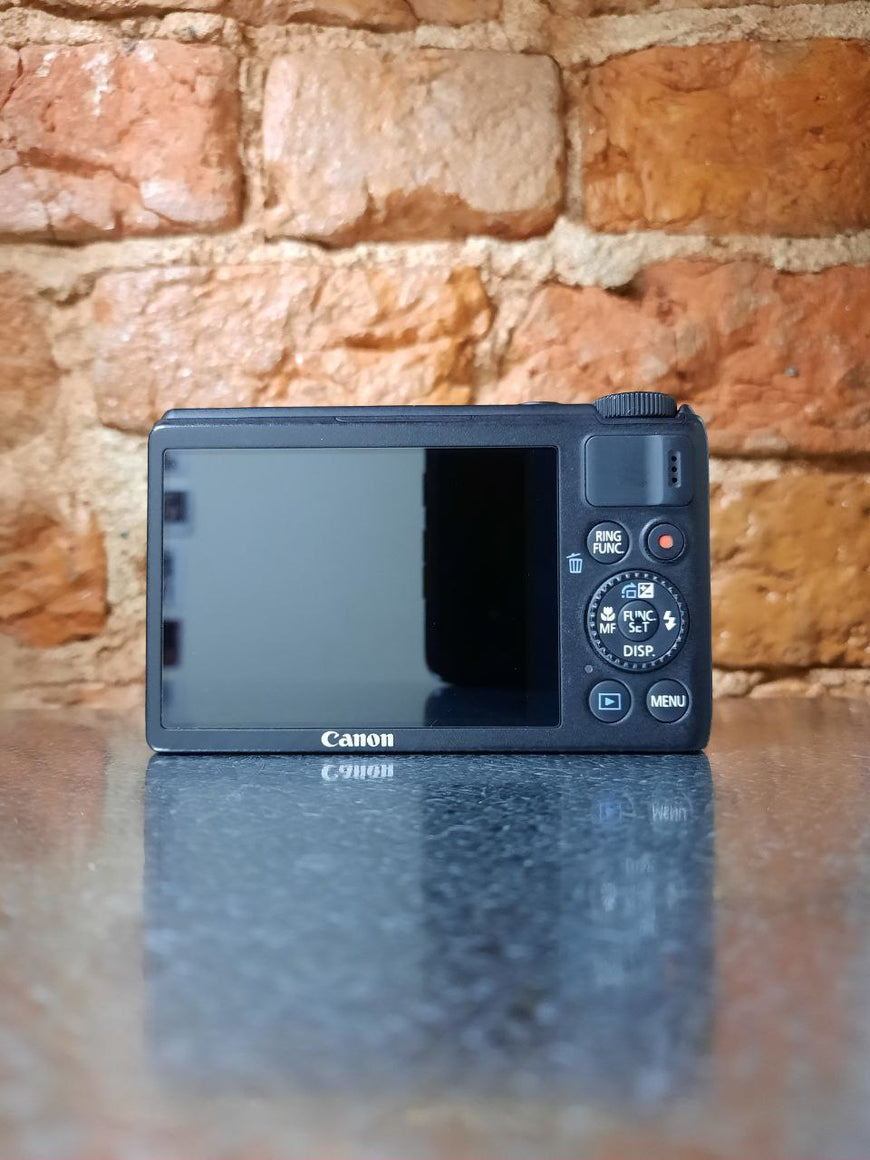 Canon PowerShot S100 черный топовый цифровой фотоаппарат