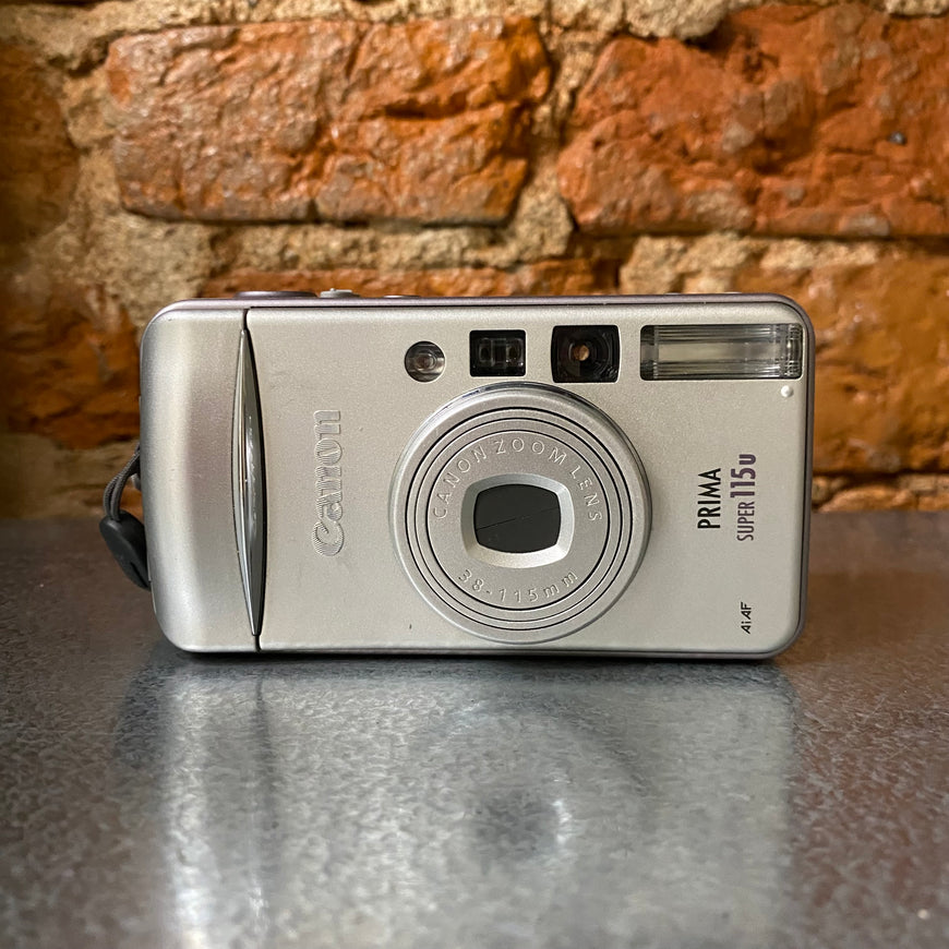 Canon Prima Super 115u пленочный фотоаппарат