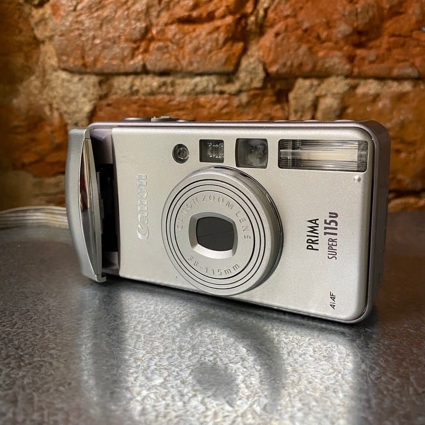Canon Prima Super 115u пленочный фотоаппарат