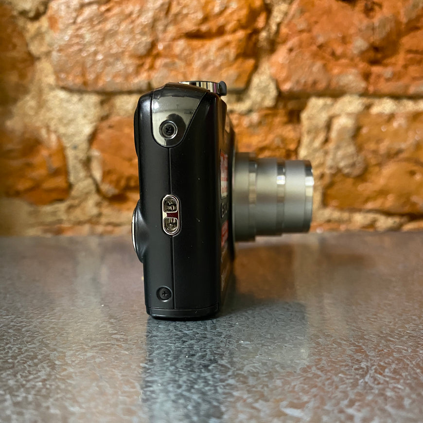 Casio Exilim EX-Z1200 черный цифровой фотоаппарат с док станцией