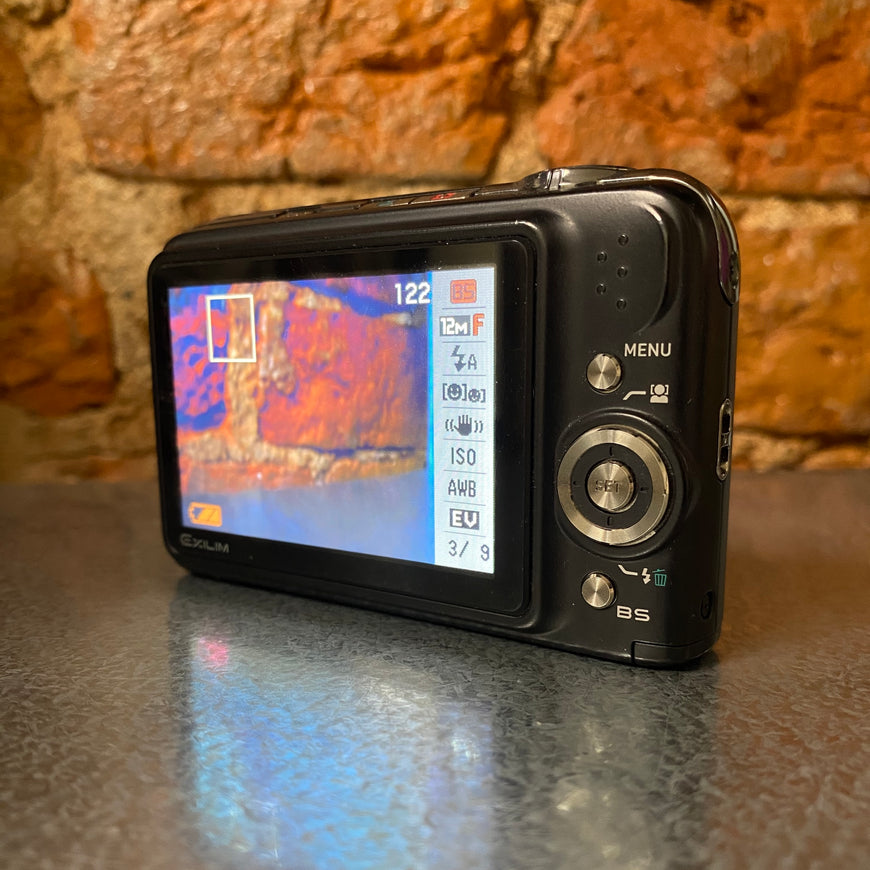 Casio Exilim EX-Z1200 черный цифровой фотоаппарат с док станцией