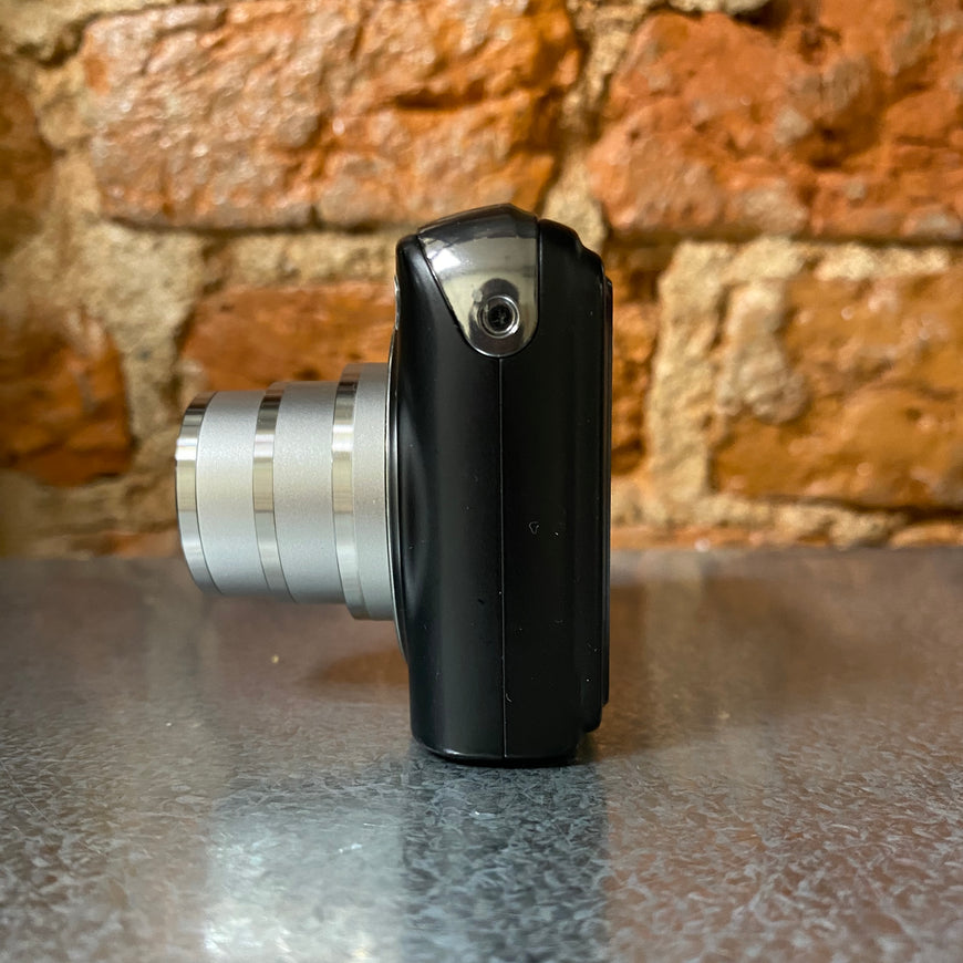 Casio Exilim EX-Z1200 черный цифровой фотоаппарат с док станцией