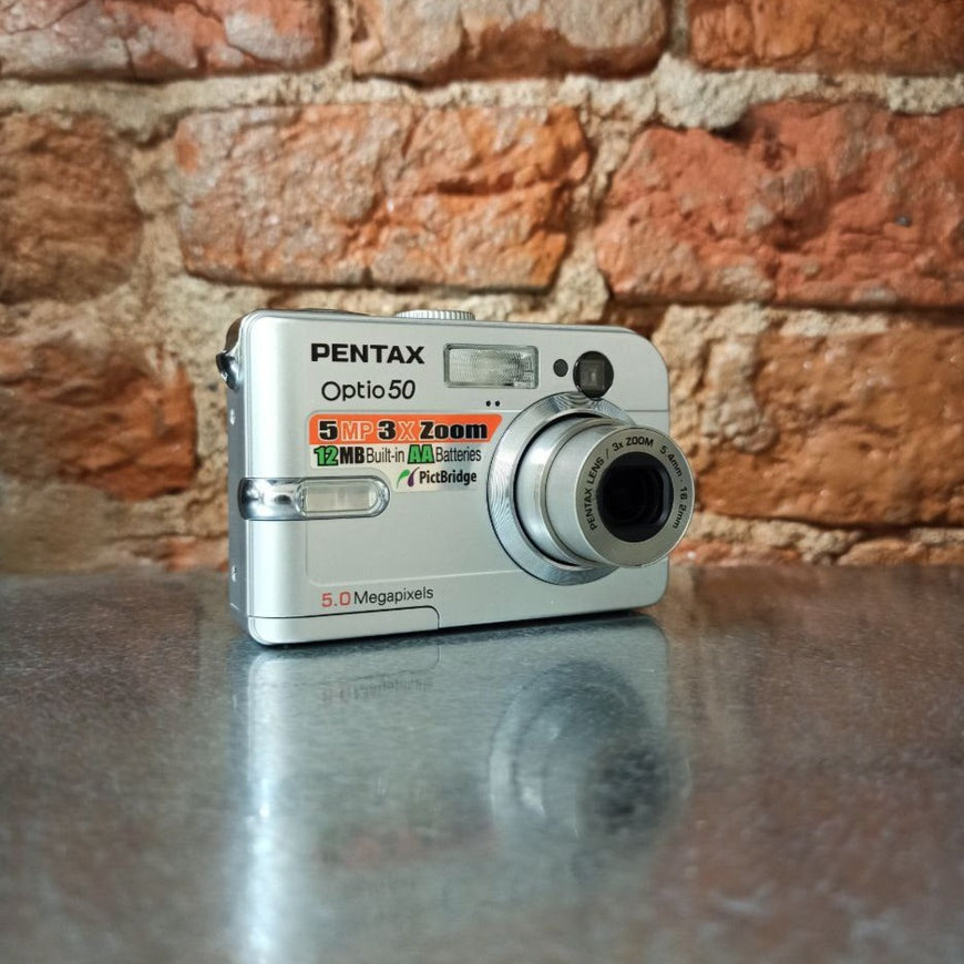 Pentax Optio 50 новый цифровой фотоаппарат