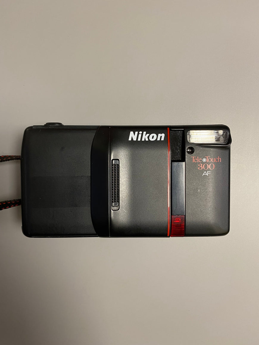Nikon Tele Touch 300 AF плёночный фотоаппарат